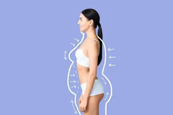 image of woman experiencing fat reduction treatment North Wembley