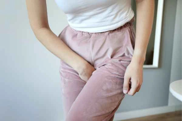 woman struggling with urine incontinence North Wembley