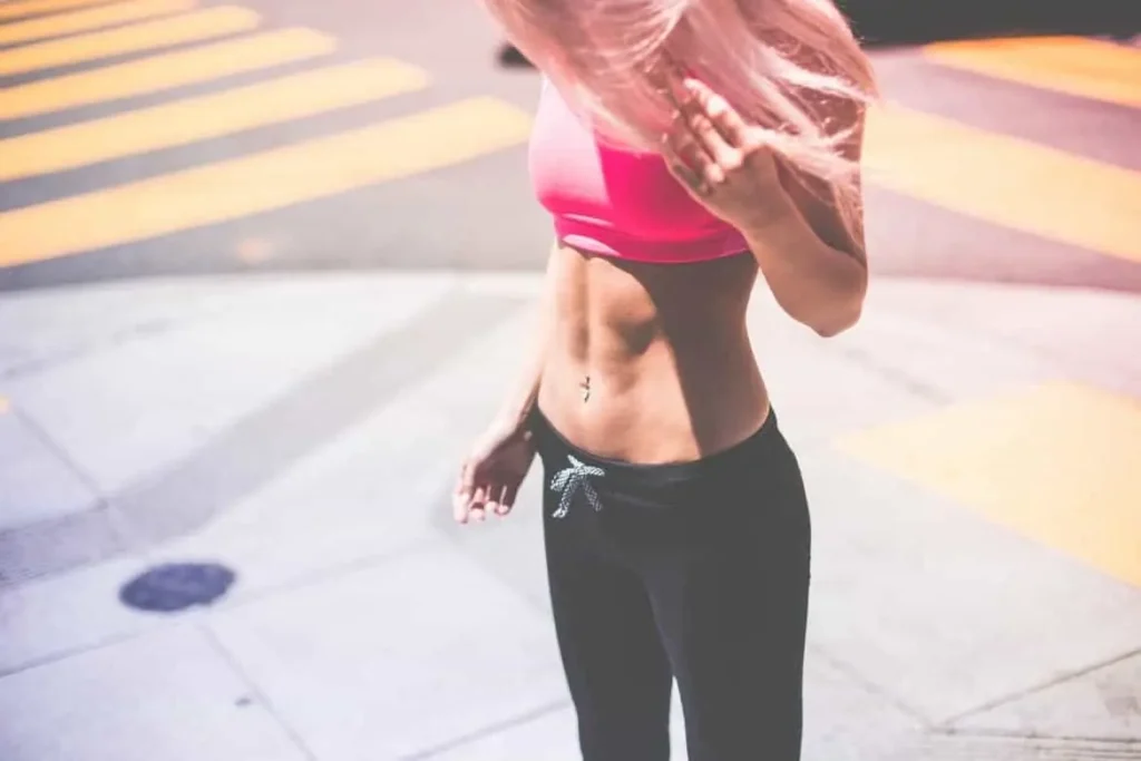Woman with toned stomach after LA-EMS Body Sculpting Treatment North Wembley